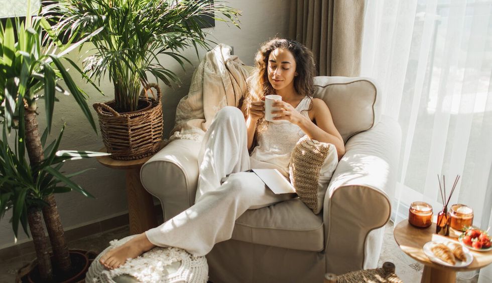 woman sitting with tea e1684176789718