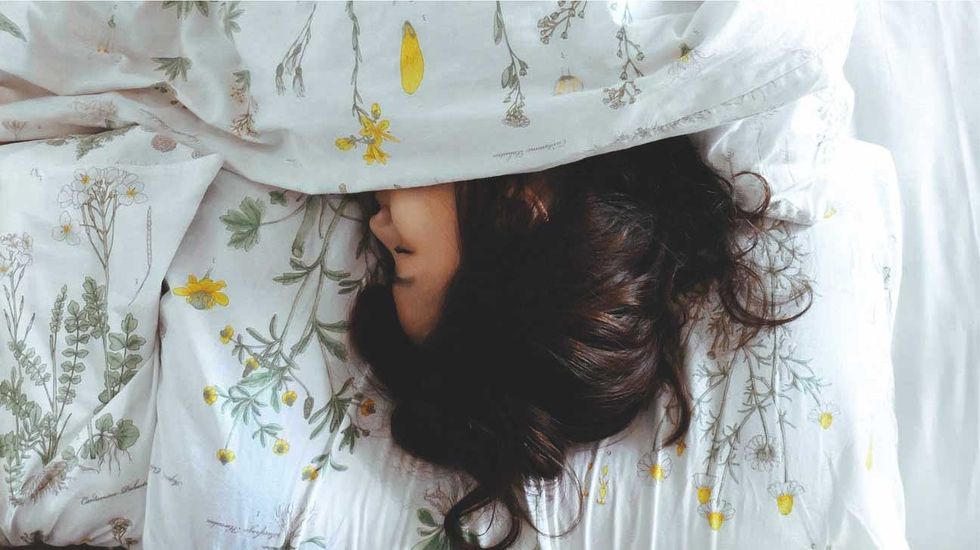 woman sleeping in bed 1