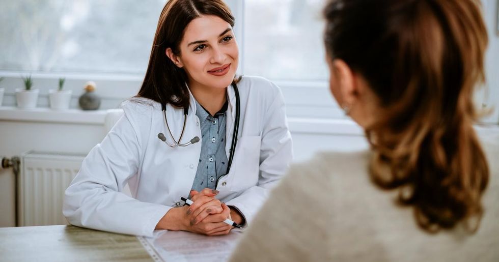 woman talking to her doctor