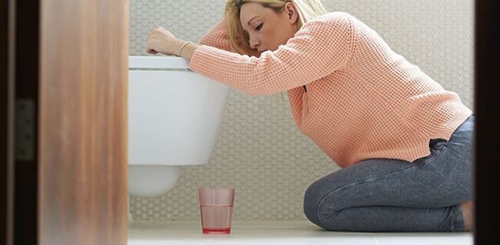 woman toilet morning sickness pregnant