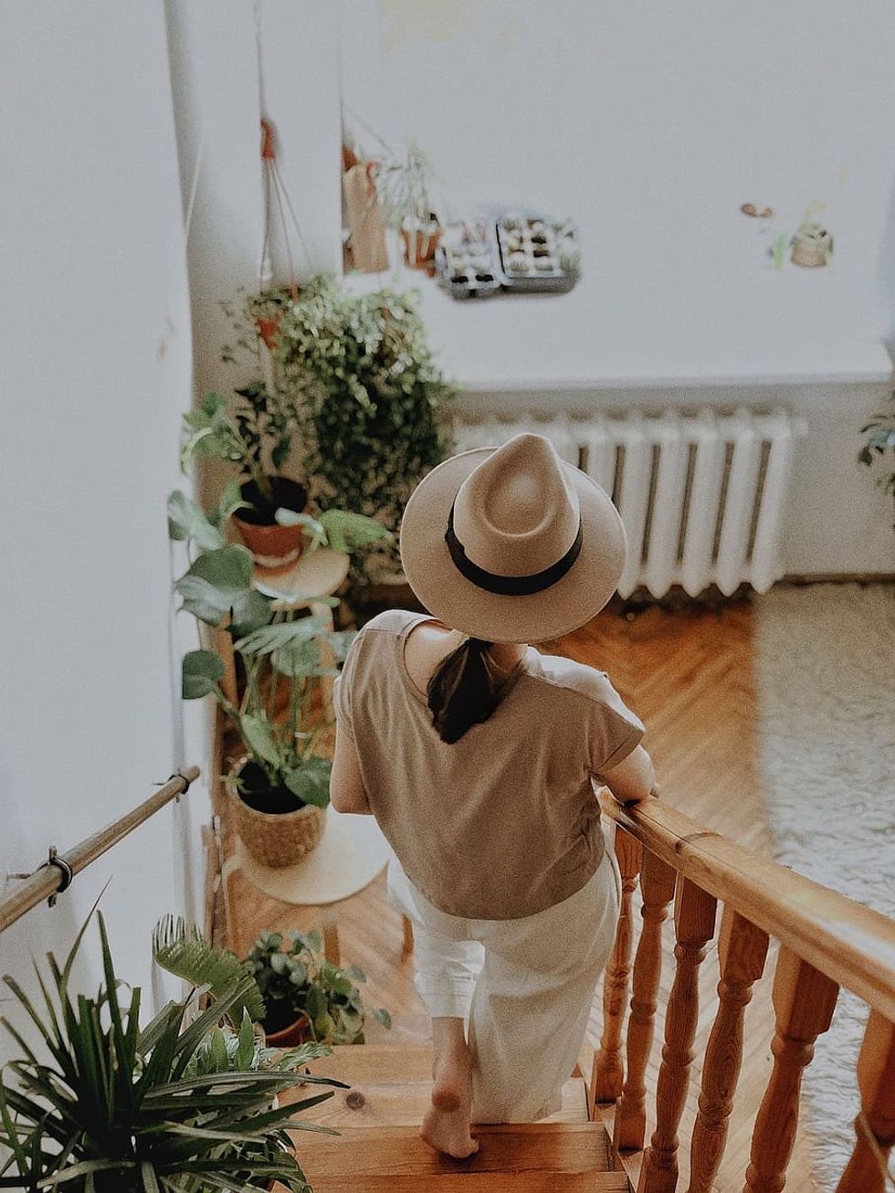 woman walking stairs down