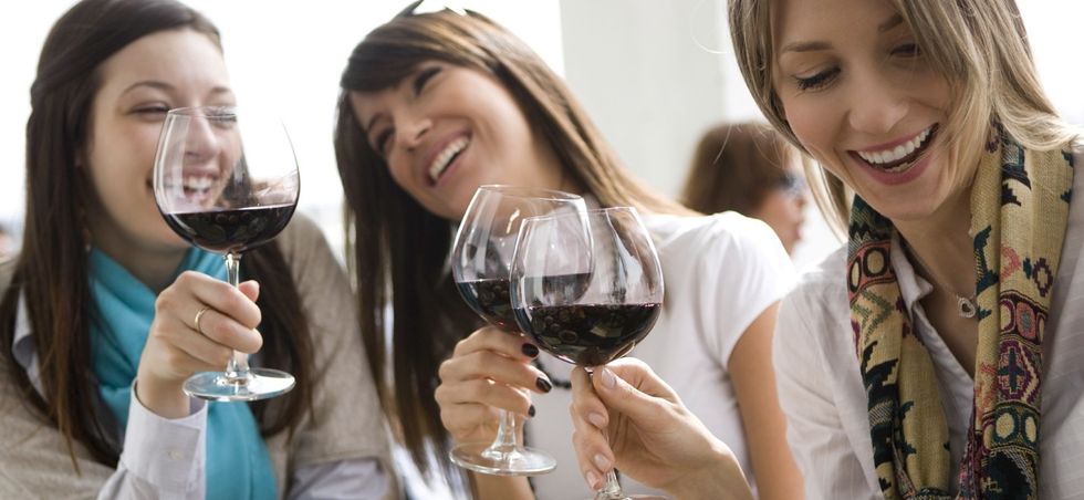 women drinking wine
