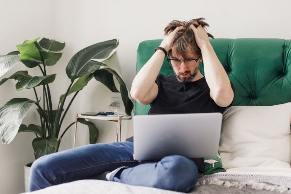 working tired man front computer man is tired working home stay home 209729 754