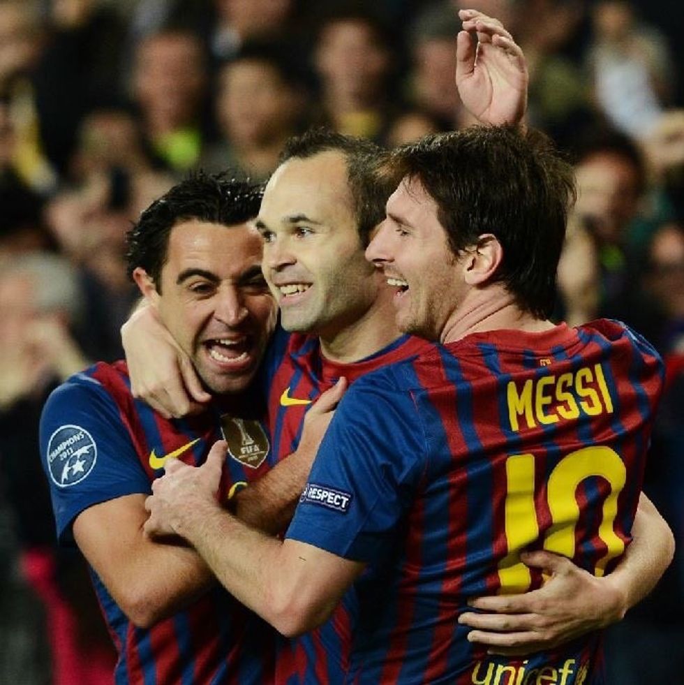 xavi iniesta messi