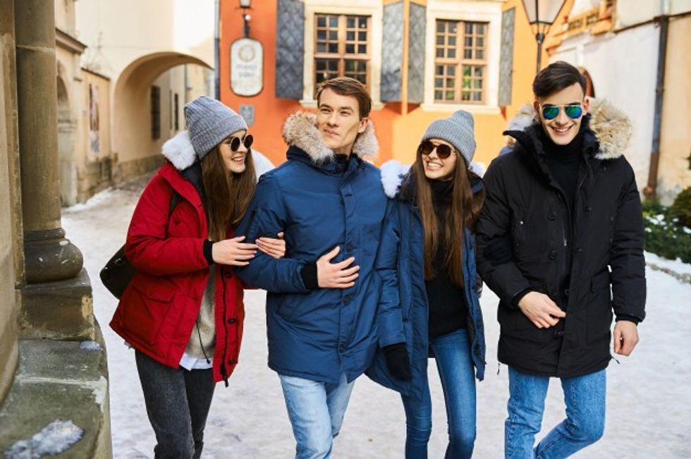 young friends having fun outdoors winter time concept friendship fun with new trends w 3579 4805