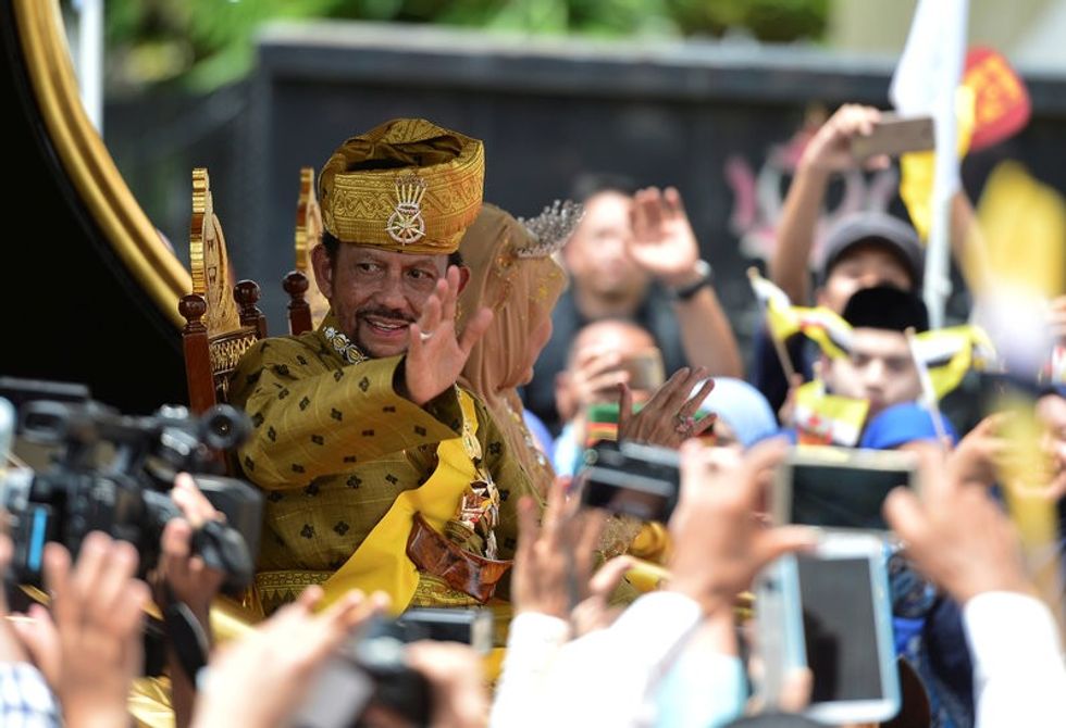 your gilded chariot awaits brunei sultan celebrates 50 years in power