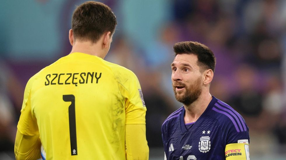 z29207786IERKatar 2022 Wojciech Szczesny i Leo Messi w meczu