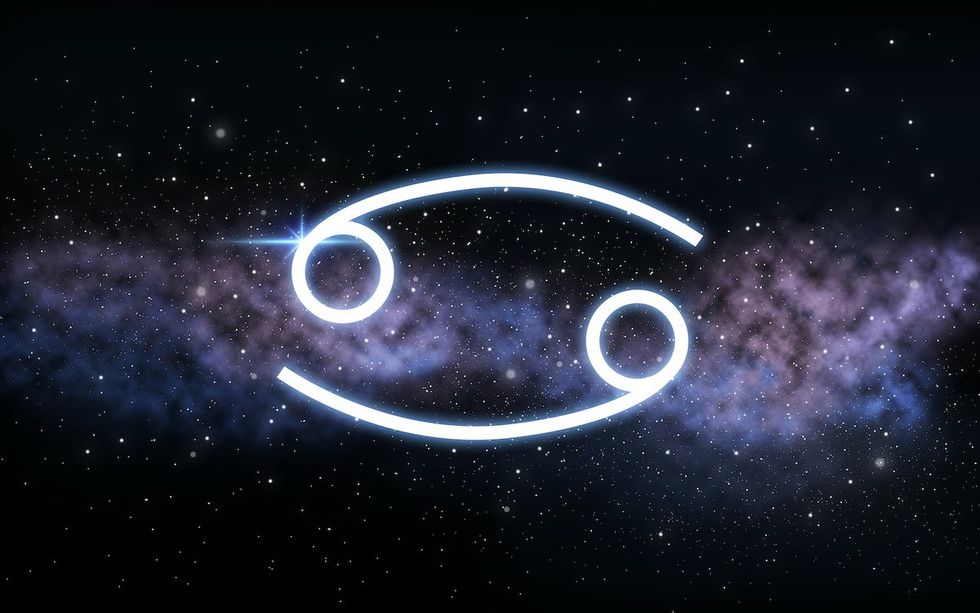 Zodiac Cancer Sign With Stars in Background