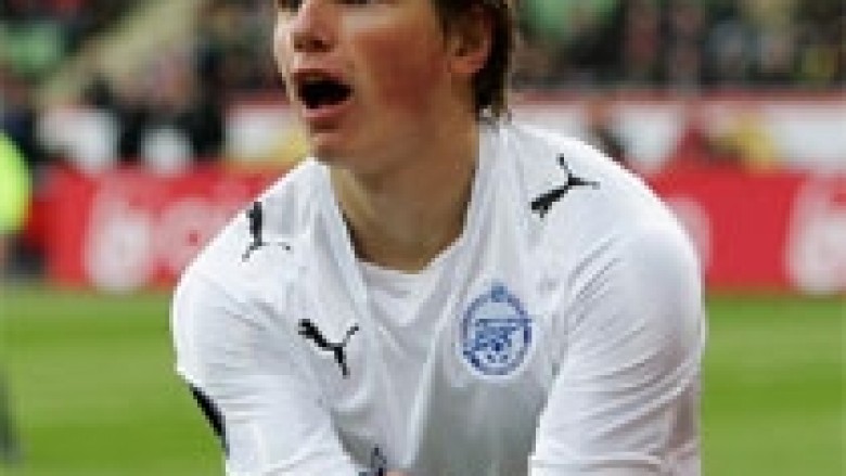 Arshavin lavdëron Wengerin