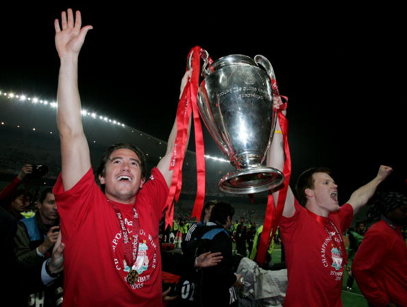 ISTANBUL, TURKEY - MAY 25: Liverpool defender John Arne Riise of Norway (R) and winger Harry Kewell of Australia lifts the European Cup after Liverpool won the European Champions League against AC Milan on May 25, 2005 at the Ataturk Olympic Stadium in Istanbul, Turkey. (Photo by Clive Brunskill/Getty Images)