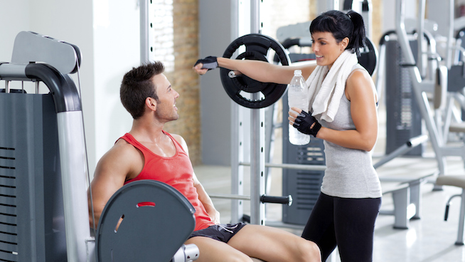man and woman friends on sport gym relaxed