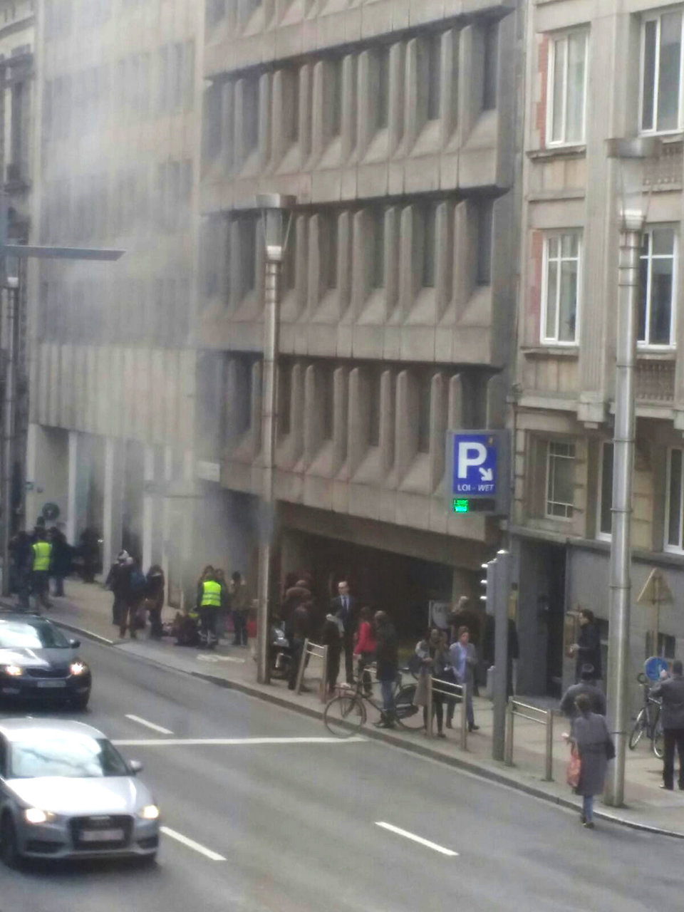 A picture taken on March 22, 2016 shows smoke rising from the Maalbeek underground, in Brussels, following a blast at the station close to the capital's European quarter.  The Brussels metro service was being shut down on March 22, its operator said. The measure came after a rush-hour explosion at Maalbeek station with TV images showing black smoke pouring from the station entrance.  / AFP / Belga / Seppe KNAPEN / Belgium OUT        (Photo credit should read SEPPE KNAPEN/AFP/Getty Images)