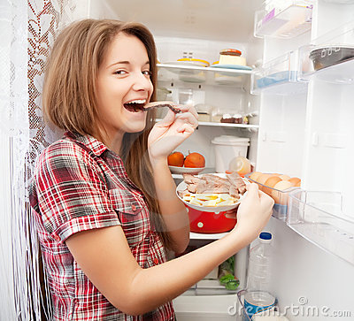 girl-eating-meat-fridge-18373240