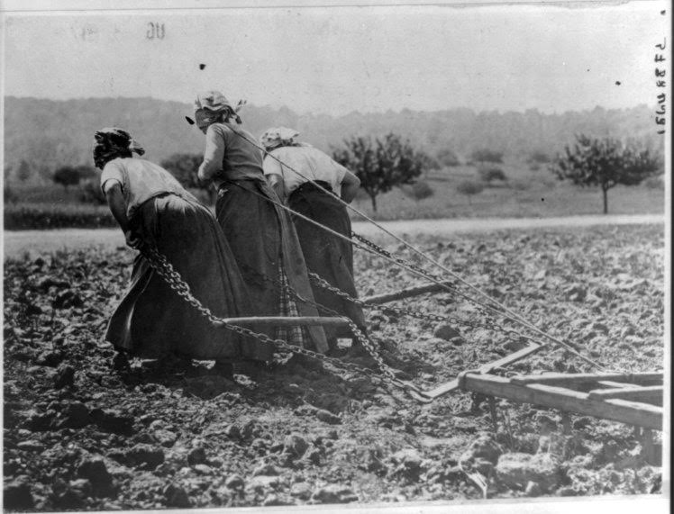 Peasants in the re-taken Somme District work in the fields, circa 1916- 1917, in this Library of Congress handout photo. For women 100 years ago, opportunities to work beyond the home and take part in political life were very limited. As the 20th century progressed, hard-won progress included gradually improved voting rights, while the upheaval of war pushed doors ajar as women worked as part of the war effort. U.S. Library of Congress archive photos show women's workplaces ranging from a flour mill in England to a coal mine in Belgium or Lincoln Motor Co.'s welding department in Detroit. International Women's Day is celebrated on March 8. REUTERS/Library of Congress/Handout via Reuters SEARCH "THE WIDER IMAGE" FOR ALL STORIES ATTENTION EDITORS - THIS PICTURE WAS PROVIDED BY A THIRD PARTY. REUTERS IS UNABLE TO INDEPENDENTLY VERIFY THE AUTHENTICITY, CONTENT, LOCATION OR DATE OF THIS IMAGE. THIS PICTURE IS DISTRIBUTED EXACTLY AS RECEIVED BY REUTERS, AS A SERVICE TO CLIENTS. FOR EDITORIAL USE ONLY. NOT FOR SALE FOR MARKETING OR ADVERTISING CAMPAIGNS. TPX IMAGES OF THE DAY TPX IMAGES OF THE DAY