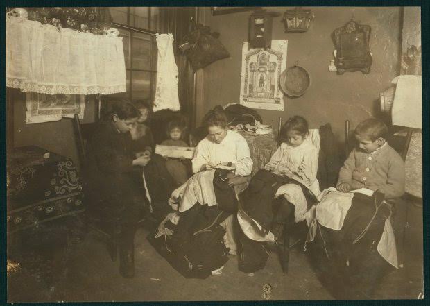 The Onofrio Cottone family finish garments in a tenement in New York, January 1913, in this Library of Congress handout photo. The three oldest children Joseph, 14, Andrew, 10, and Rosie, 7, help their mother sew garments and together they make about $2 a week when work is plenty. For women 100 years ago, opportunities to work beyond the home and take part in political life were very limited. As the 20th century progressed, hard-won progress included gradually improved voting rights, while the upheaval of war pushed doors ajar as women worked as part of the war effort. U.S. Library of Congress archive photos show women's workplaces ranging from a flour mill in England to a coal mine in Belgium or Lincoln Motor Co.'s welding department in Detroit. International Women's Day is celebrated on March 8. REUTERS/National Child Labor Committee Collection/Library of Congress/Handout via Reuters SEARCH "THE WIDER IMAGE" FOR ALL STORIES ATTENTION EDITORS - THIS PICTURE WAS PROVIDED BY A THIRD PARTY. REUTERS IS UNABLE TO INDEPENDENTLY VERIFY THE AUTHENTICITY, CONTENT, LOCATION OR DATE OF THIS IMAGE. THIS PICTURE IS DISTRIBUTED EXACTLY AS RECEIVED BY REUTERS, AS A SERVICE TO CLIENTS. FOR EDITORIAL USE ONLY. NOT FOR SALE FOR MARKETING OR ADVERTISING CAMPAIGNS.