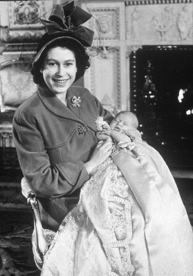 1948 - Her Majesty Queen Elizabeth II pictured when she was Princess Elizabeth with her first baby Prince Charles at Christening in 1948