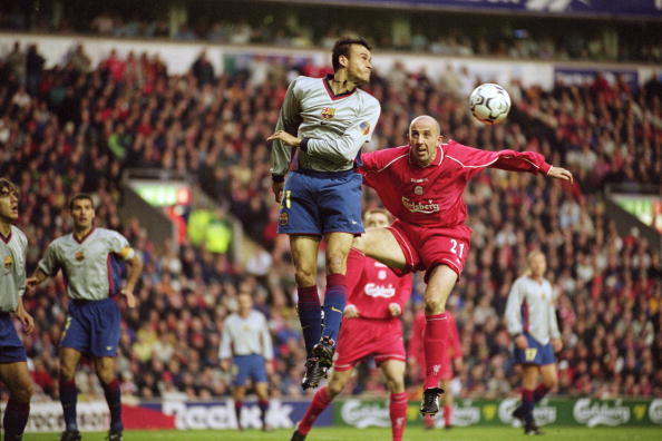 19 Apr 2001: Luis Enrique of Barcelona clears from Gary McAllister of Liverpool during the UEFA Cup semi-final second leg match played at Anfield, in Liverpool, England. Liverpool won the match 1-0, and went through to the final with a 1-0 aggregate win. Mandatory Credit: Clive Brunskill /Allsport