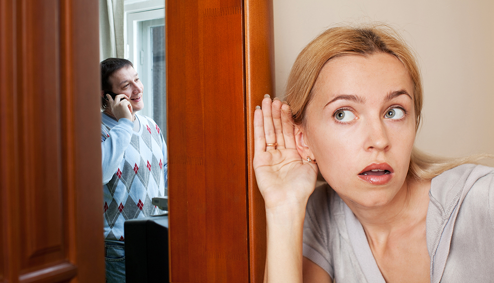 bigstock-Jealous-wife-overhearing-a-ph-18349940