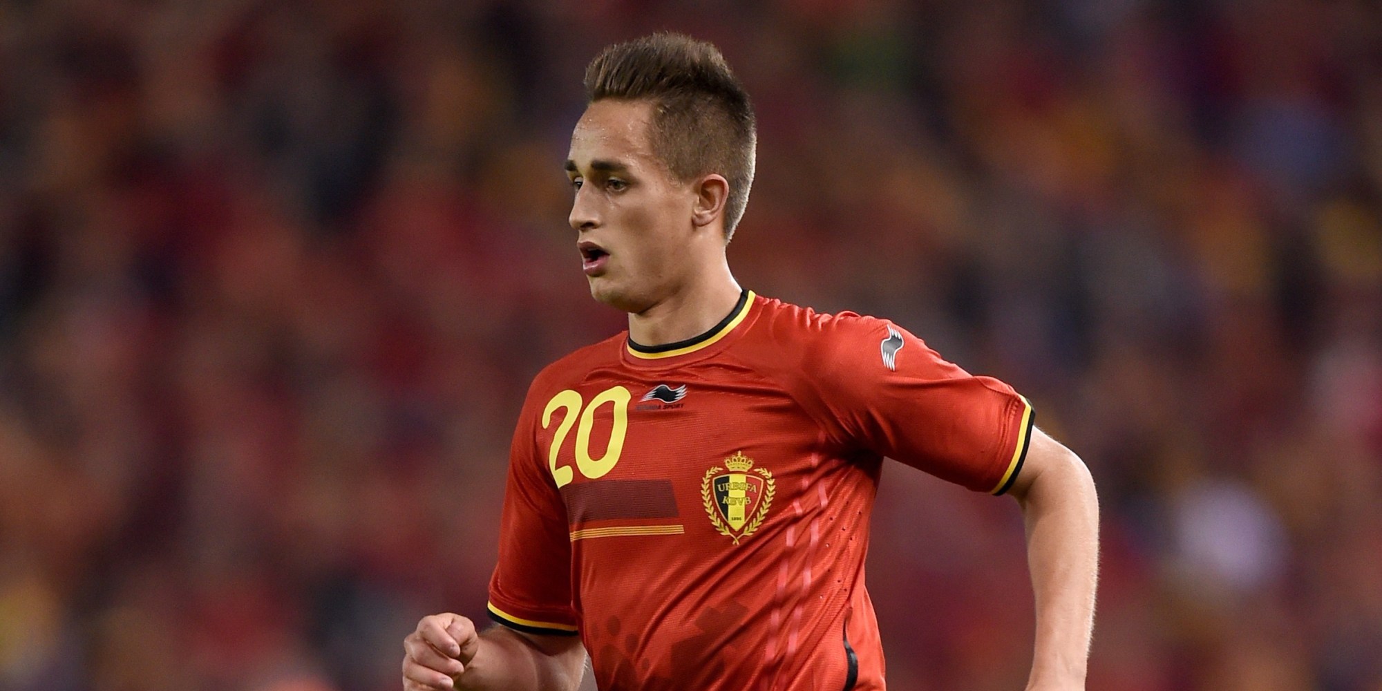 Belgium's forward Adnan Januzaj moves the ball during the friendly football match between Belgium and Luxembourg at the Fenix Stadium, on May 26, 2014 in Genk. AFP PHOTO / JOHN THYS (Photo credit should read JOHN THYS/AFP/Getty Images)