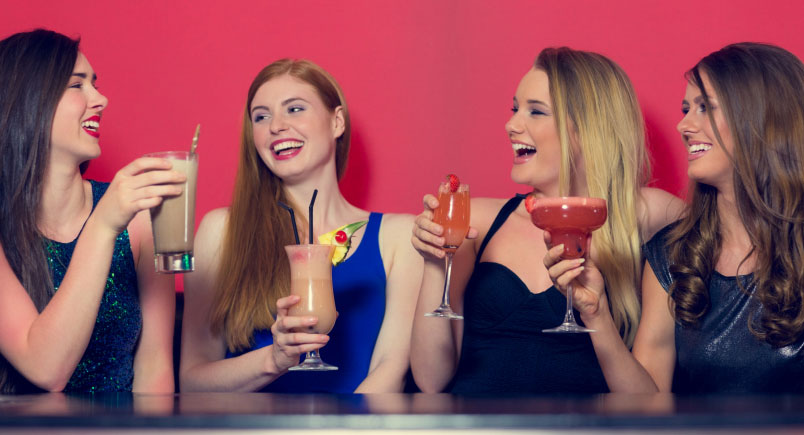 women-drinking-cocktails-laughing-061014-11