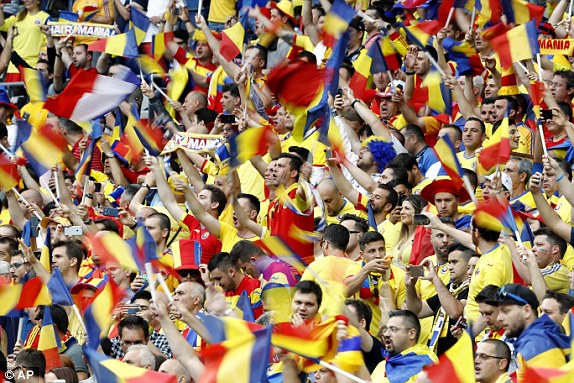 1465584109300_lc_galleryImage_Romanian_fans_wave_their_