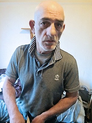 NEWS- ALBANIAN SPECIAL - Collect picture - Albanian,convicted murderer,Avni Metra at his lodgings in Borehamwood.