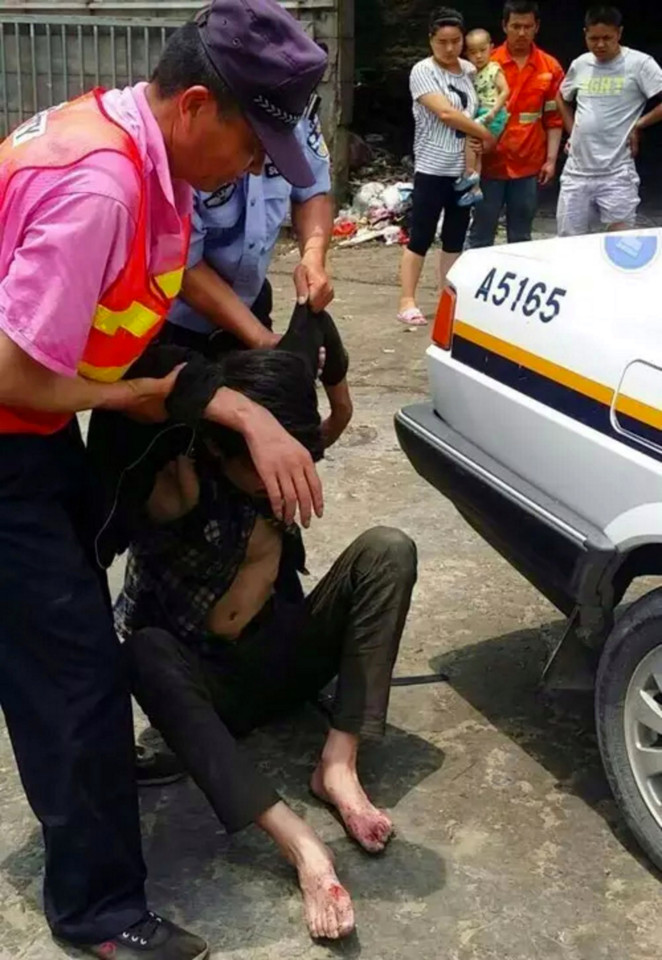 Pic shows: The gamer being helped by police. Police rescued a teenager who was so addicted to online gaming he let his feet rot when he went on a six-day binge at an internet cafe and forgot to wash or feed himself and later collapsed. The unnamed man, aged 19, had apparently run away from home in order to go on the bizarre and dangerous gaming adventure, with his own father even reluctant to take him home. Authorities in Hangzhou, capital of East Chinas Zhejiang Province, reportedly came across the young gamer after he was spotted lying unconscious behind the shrubs of a railway track. He was found with bleeding and infected feet, which had festered and which let off a putrid smell. The man only woke briefly to ask for water as he was dragged back to the police station for some basic medical attention. He told authorities that he had not eaten for three days, having spent all his money on a six-day, non-stop gaming spree at the internet cafe. It was clear that he had not taken a shower during the time either, which is thought to be the main contributing factor to his rotting feet. Reports said the gamers own father initially told officer that he did not want his son back, claiming that the teenager ran away from home 10 days ago and did not care for anything else besides online gaming. But after some consideration the dad asked for his son to be sent back to him. Officers said they were concerned for the young man because his foot infection could have killed him if he had not been found in time. (ends)