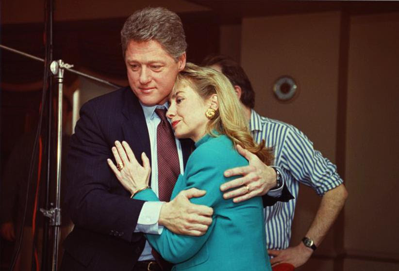 92 Arkansas Governor Bill Clinton comforts Hillary Rodham Clinton on the set of the news program '60 Minutes' after a stage light unexpectedly broke loose from the ceiling and knocked her down, January 26, 1992. (Photo by CBS Photo Archive/Getty Images)