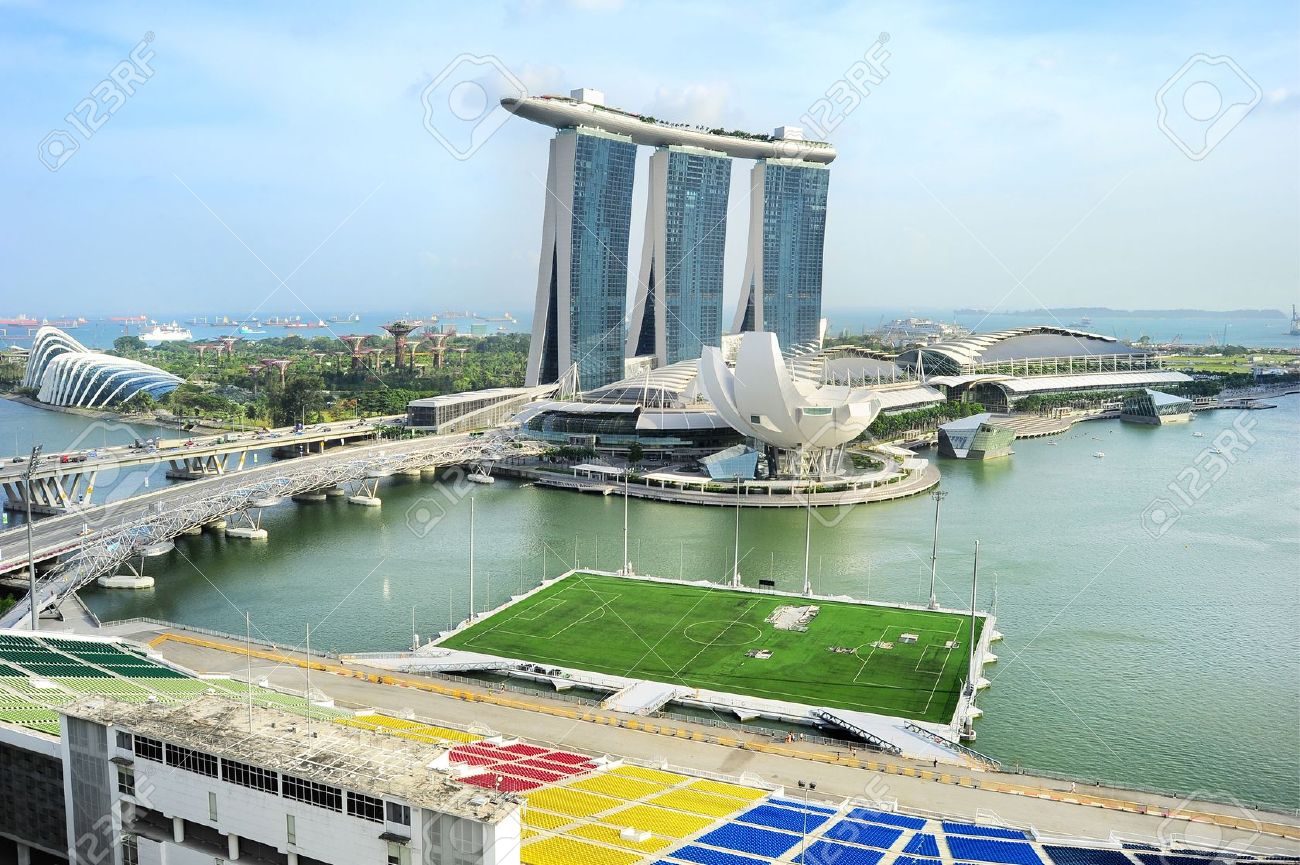 18799425-Aerial-view-on-Marina-Bay-Floating-Platform-Marina-Bay-Sands-resort-and-Garden-by-the-Bay-in-Singapo-Stock-Photo