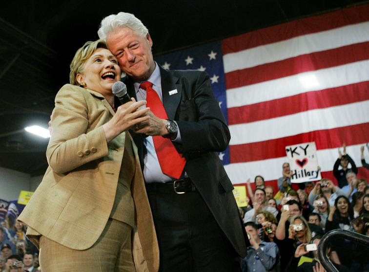 2008 Democratic presidential hopeful Sen. Hillary Rodham Clinton, D-N.Y., is hugged by her husband, former President Bill Clinton as he introduces her during a campaign rally in Louisville, Ky. Monday, May 19, 2008. (AP Photo/Elise Amendola)