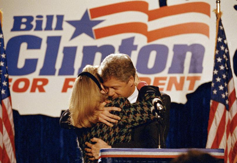 1992 Democratic presidential candidate Bill Clinton hugs his wife Hillary after she introduced him to well wishers at a downtown Chicago hotel, March 10, 1992.  (AP Photo/Ralf-Finn Hestoft)