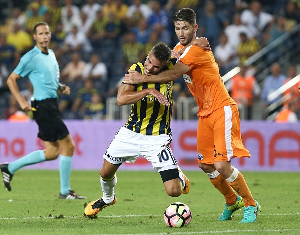 ISTANBUL, TURKEY - AUGUST 18: Robin van Persie (10) of Fenerbahce in action against Alban Pnishi (R) of Grasshoppers during the UEFA Europa League First playoff round match between Fenerbahce and Grasshoppers at Ulker Stadium in Istanbul, Turkey on August 18, 2016. (Photo by Arif Hudaverdi Yaman/Anadolu Agency/Getty Images)