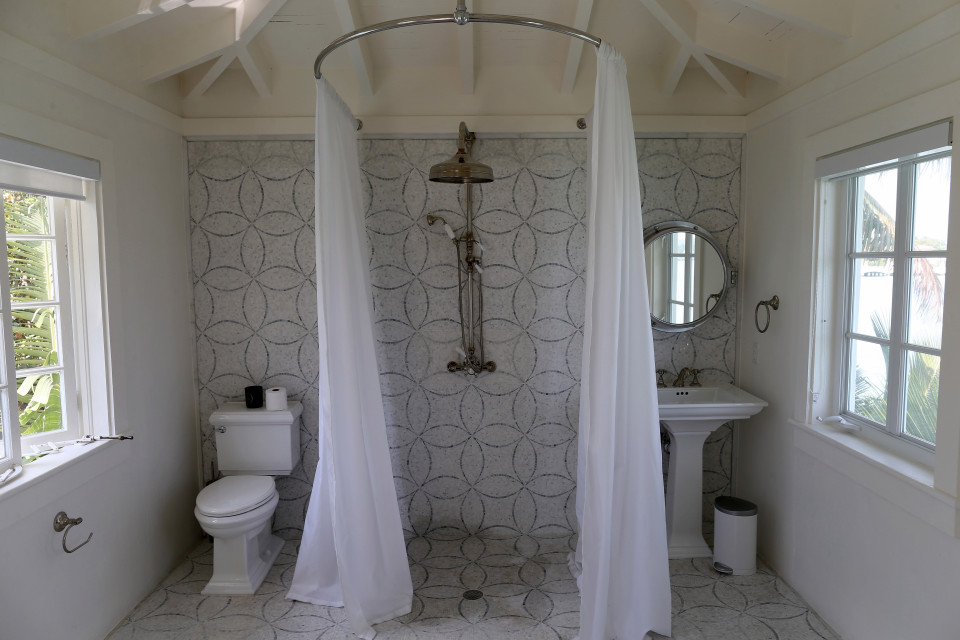 MIAMI BEACH, FL - MARCH 18: The bathroom is seen in the pool cabana during a tour of the former home of Al Capone on March 18, 2015 in Miami Beach, Florida. The home being restored by MB America was built in 1922 and bought by the prohibition-era gangster in 1928, the property, now renamed 93 Palm, is one of Miamis oldest and most notorious estates. The colonial-style, seven-bedroom property features three houses - the gate house, the main villa and the pool cabana. (Photo by Joe Raedle/Getty Images)
