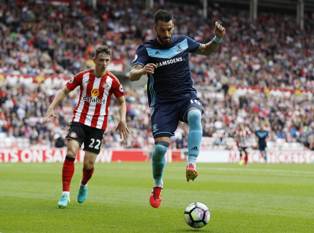 Britain Soccer Football - Sunderland v Middlesbrough - Premier League - Stadium of Light - 21/8/16 Middlesbrough's Alvaro Negredo in action with Sunderland's Donald Love Action Images via Reuters / Lee Smith Livepic EDITORIAL USE ONLY. No use with unauthorized audio, video, data, fixture lists, club/league logos or "live" services. Online in-match use limited to 45 images, no video emulation. No use in betting, games or single club/league/player publications. Please contact your account representative for further details.