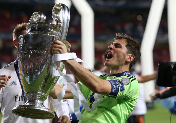 LISBON, PORTUGAL - MAY 24:  Iker Casillas of Real Madrid celebrates with the trophy during the UEFA Champions League Final match between Real Madrid and Athletico Madrid at The Estadio da Luz on May 24, 2014 in Lisbon, Portugal.  (Photo by Ian MacNicol/Getty Images)