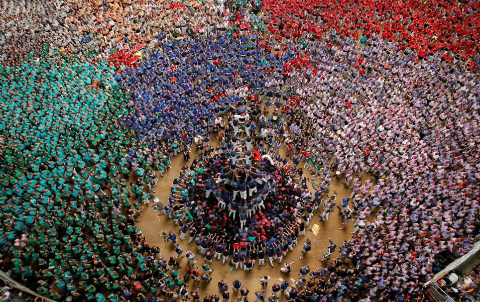 Capgrossos de Matato form a human tower called "castell" during a biannual competition in Tarragona city, Spain, October 2, 2016. REUTERS/Albert Gea