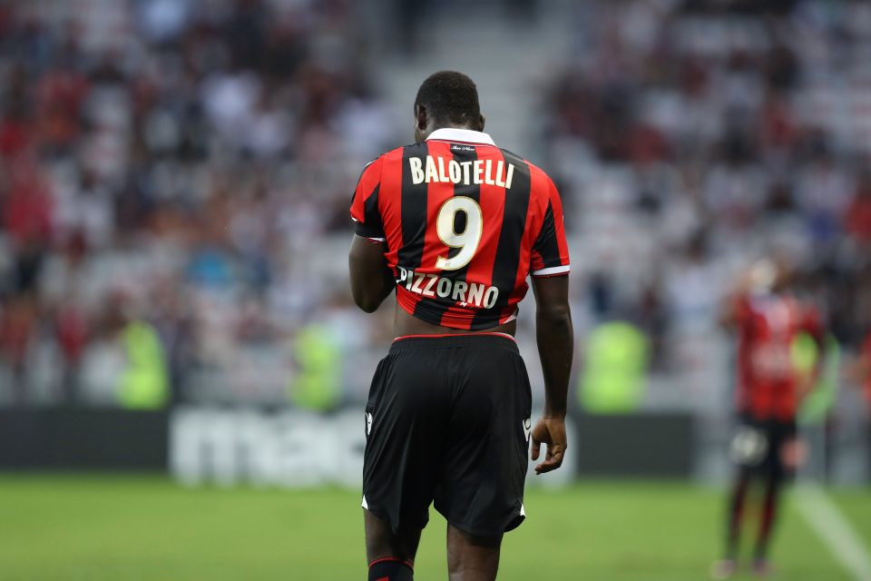 Nice's Italian forward Mario Balotelli leaves the pitch after receiving a red card for taking off his jersey during the French L1 football match Nice (OGCN) vs Lorient (FCL) on October 2, 2016 at the "Allianz Riviera" stadium in Nice, southeastern France. / AFP PHOTO / VALERY HACHEVALERY HACHE/AFP/Getty Images
