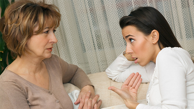 Mother and daughter sitting on the sofa and having a serious talking.; Shutterstock ID 67130050; PO: The Huffington Post; Job: The Huffington Post; Client: The Huffington Post; Other: The Huffington Post