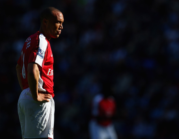 WIGAN, ENGLAND - APRIL 11: Mikael Silvestre of Arsenal in action during the Barclays Premier League match between Wigan Athletic and Arsenal at The JJB Stadium on April 11, 2009 in Wigan, England.  (Photo by Laurence Griffiths/Getty Images)