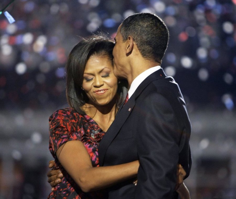 Democratic presidential candidate, Sen. Barack Obama, D-Ill., kisses his wife, Michelle Obama, after giving his acceptance speech at the Democratic National Convention at Invesco Field at Mile High in Denver Thursday, Aug. 28, 2008.(AP Photo/Alex Brandon)