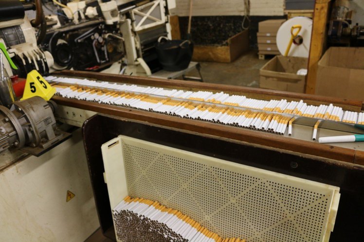 Undated handout photo issued by HM Revenue & Customs of fraudulent cigarettes in a factory in Birmingham which has been shut down and 10 men arrested. PRESS ASSOCIATION Photo. Issue date: Monday November 14, 2016. Customs officials who led the raid on the plant, which is thought to be capable of churning out 35 million dodgy cigarettes a month, found it kitted out with machinery able to produce and package cigarettes on an industrial scale. See PA story POLICE Cigarettes. Photo credit should read: HMRC/PA Wire NOTE TO EDITORS: This handout photo may only be used in for editorial reporting purposes for the contemporaneous illustration of events, things or the people in the image or facts mentioned in the caption. Reuse of the picture may require further permission from the copyright holder.