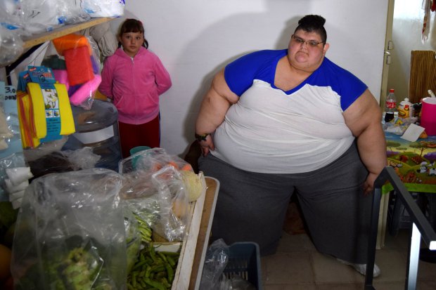 Juan Pedro, 32, sits on a chair while waiting for paramedics to transport him to a hospital in Guadalajara, to undergo treatment in order to shed excess from his 500-kilo weight, in Aguascalientes, Mexico, November 15, 2016. Picture taken November 15, 2016. REUTERS/Liberto Urena FOR EDITORIAL USE ONLY. NO RESALES. NO ARCHIVES.