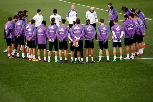 real-madrids-players-observe-a-minute-of-silence-at-real-madrids-valdebebas-training-ground-outsid