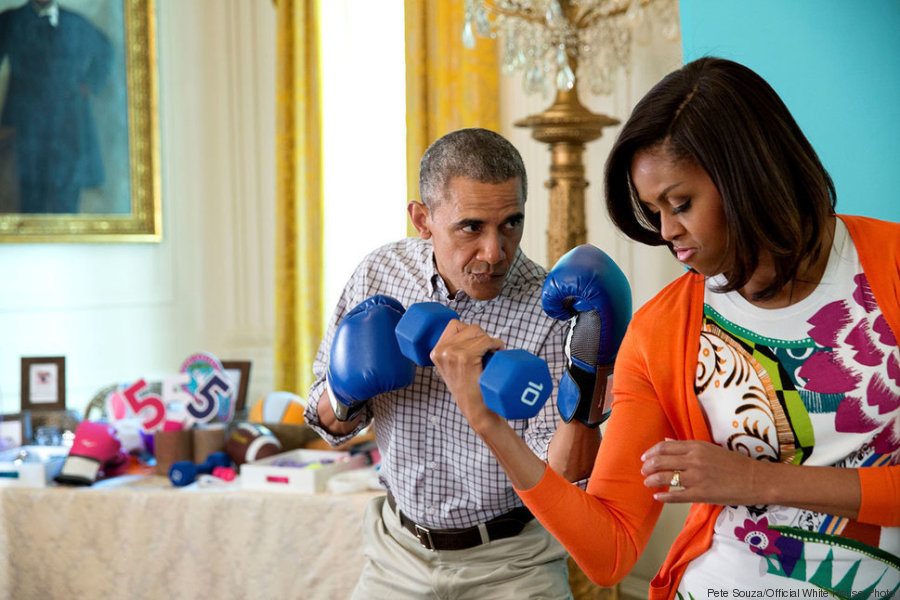 President Barack Obama and First Lady Michelle Obama pose for photos at the Instagram #GimmeFive photo booth in the East Room of the White House during the annual Easter Egg Roll, April 6, 2015. (Official White House Photo by Pete Souza) This official White House photograph is being made available only for publication by news organizations and/or for personal use printing by the subject(s) of the photograph. The photograph may not be manipulated in any way and may not be used in commercial or political materials, advertisements, emails, products, promotions that in any way suggests approval or endorsement of the President, the First Family, or the White House.