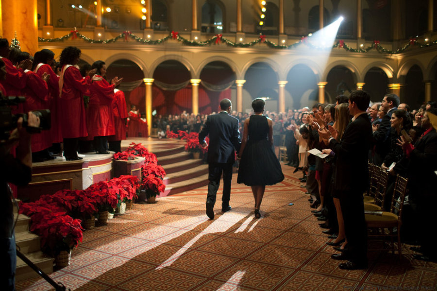 President Barack Obama and First Lady Michelle Obama attend the "Christmas in Washington" taping at the National Building Museum in Washington, D.C., Dec. 13, 2009. (Official White House Photo by Pete Souza) This official White House photograph is being made available only for publication by news organizations and/or for personal use printing by the subject(s) of the photograph. The photograph may not be manipulated in any way and may not be used in commercial or political materials, advertisements, emails, products, promotions that in any way suggests approval or endorsement of the President, the First Family, or the White House.