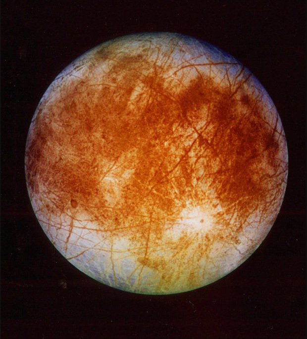 This image, released Nov. 12, 1996, by the Jet Propulsion Laboratory in Pasadena, Calif., shows Jupiter's ice-covered moon, Europa. The Galileo spacecraft has captured images, released Wednesday, April 9, 1997, of iceberg-like structures and smooth patches on Europa providing the strongest evidence yet that an ocean _ and perhaps life _ lie beneath its frozen surface.