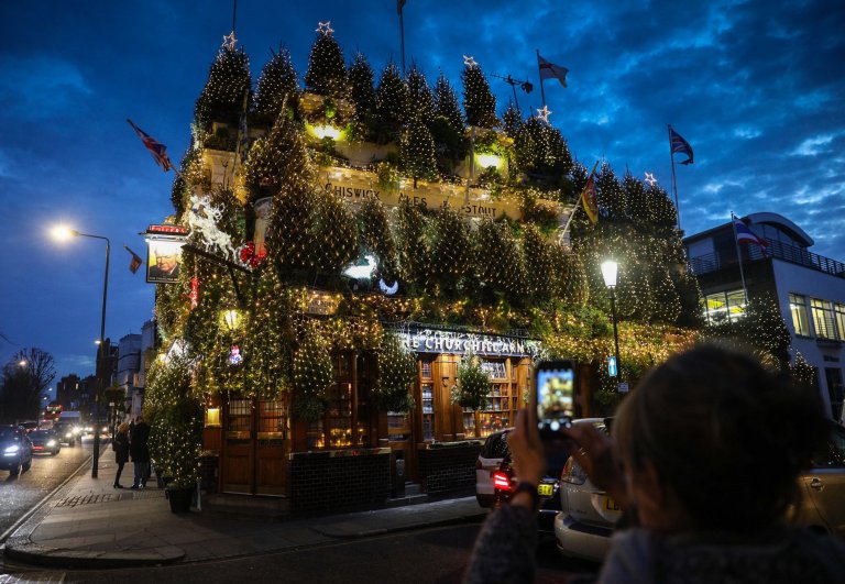 The stunning Churchill Arms pub in Kensington, London which is lit up with 85 Christmas trees, December 7 2016. The famous pub, near to Notting Hill Gate, has used flowers and plants all year round attract punters for nearly 30 years.