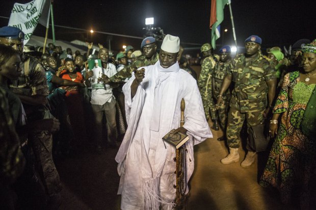 Incumbent Gambian President Yahya Jammeh, leader of the APRC (The Alliance for Patriotic Reorientation and Construction) greets his suporters in Bikama on November 24, 2016 during an electoral rally. As electoral favorite Jammeh seeks his fifth term in power, a two-week campaign period will come to an end next week ahead of the December 1st presidential election with political leaders canvassing in rural areas. / AFP / MARCO LONGARI (Photo credit should read MARCO LONGARI/AFP/Getty Images)