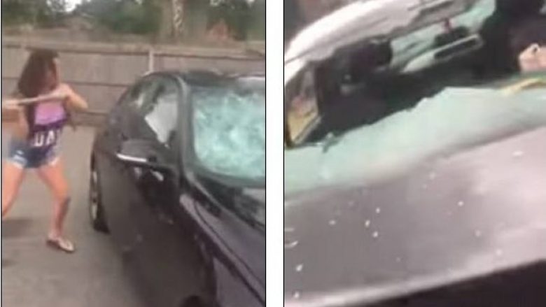 Për shkak të tradhtisë bashkëshortore, gruaja ia thyen veturën burrit të “strukur” brenda! (Video)