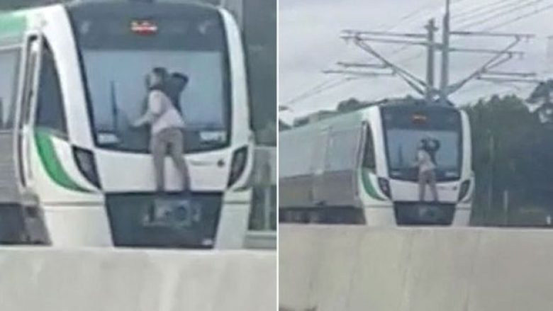 Edhe pse treni po ecte 110 kilometra në orë, 23-vjeçari nuk e kishte problem të qëndronte pas tij (Video)